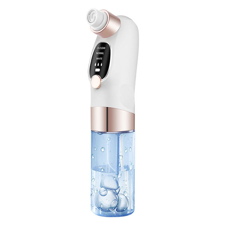 Blackhead removal device with water container and rose-gold accents: deep cleans pores, removes blackheads, and smooths skin
