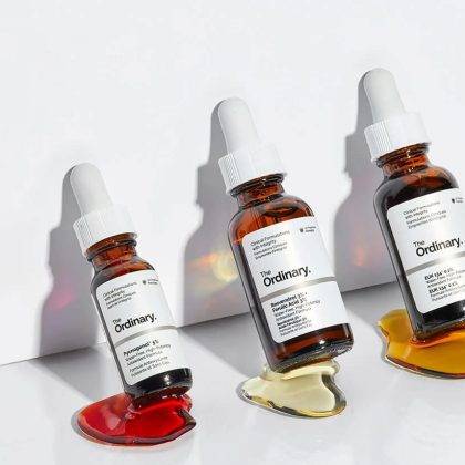 The Ordinary brand serums: three dropper bottles with different skincare liquids for hydration and skin care routines